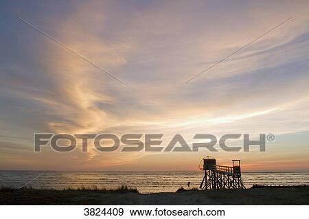 France, Les Moutiers-en-Retz, fishery at dusk. View Large Photo Image Stock Photo - France, Les Moutiers-en-Retz, fishery at dusk.. Fotosearch