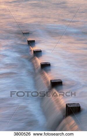 France, Les Moutiers-en-Retz, breakwater at the seashore. View Large Photo Image Stock Photograph - France, Les Moutiers-en-Retz, breakwater at the seashore.. Fotosearch