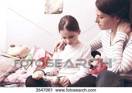 France, little girl and her mother at home View Large Photo Image Stock Image - France, little girl and her mother at home. Fotosearch