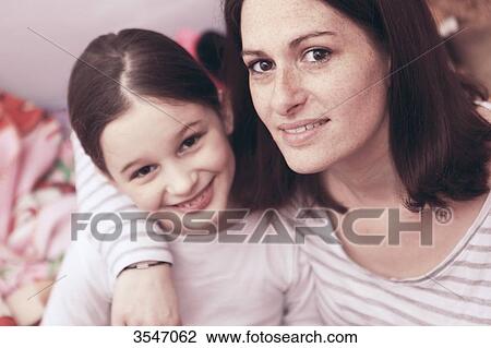 France, little girl and her mother at home View Large Photo Image Stock Image - France, little girl and her mother at home. Fotosearch