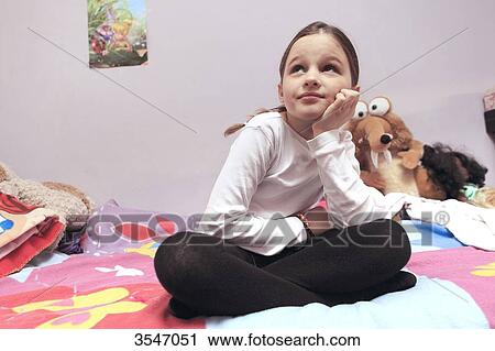 France, little girl and smartphone in her bedroom View Large Photo Image Stock Image - France, little girl and smartphone in her bedroom. Fotosearch