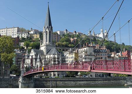 France. Lyon. The footbridge Paul Couturier (also called footbridge Saint-Georges)(1853) on the Saone and Saint-Georges church View Large Photo Image Picture - France. Lyon. The footbridge Paul Couturier (also called footbridge Saint-Georges)(1853) on the Saone and Saint-Georges church. Fotosearch