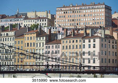 France. Lyon. The footbridge Saint Vincent on the Saone and the facades of the quay Saint Vincent View Large Photo Image Stock Image - France. Lyon. The footbridge Saint Vincent on the Saone and the facades of the quay Saint Vincent. Fotosearch