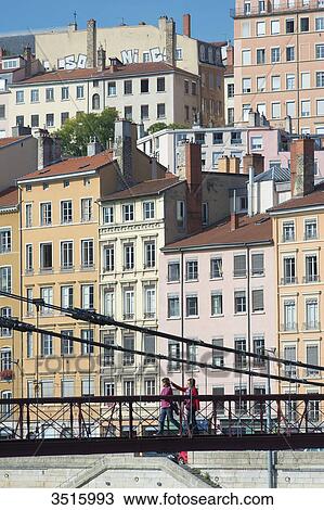 France. Lyon. The footbridge Saint Vincent on the Saone and the facades of the quay Saint Vincent View Large Photo Image Stock Image - France. Lyon. The footbridge Saint Vincent on the Saone and the facades of the quay Saint Vincent. Fotosearch