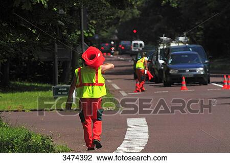 Stock Image - France, men at work. Road works. Fotosearch
