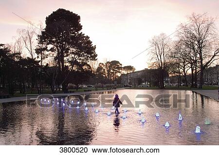 France, Nantes, little girl crossing the water mirror near to the Castle. View Large Photo Image Stock Image - France, Nantes, little girl crossing the water mirror near to the Castle.. Fotosearch