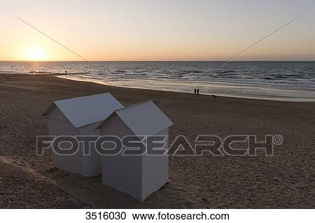 France, Normandy, beach huts on the beach at sunset View Large Photo Image Stock Image - France, Normandy, beach huts on the beach at sunset. Fotosearch