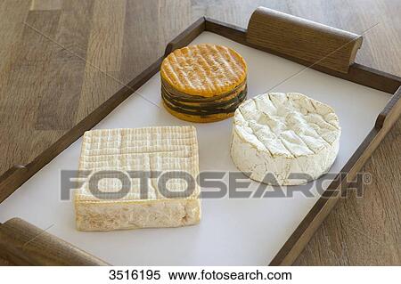 France, Normandy, cheeseboard with three typical norman cheeses View Large Photo Image Stock Photography - France, Normandy, cheeseboard with three typical norman cheeses. Fotosearch