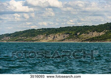 Stock Image - France, Normandy, cliffs seen from the sea at Houlgate. Fotosearch