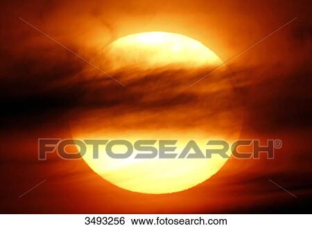 France, Normandy. Closeup of the sun shortly before sunset. View Large Photo Image Stock Photograph - France, Normandy. Closeup of the sun shortly before sunset.. Fotosearch