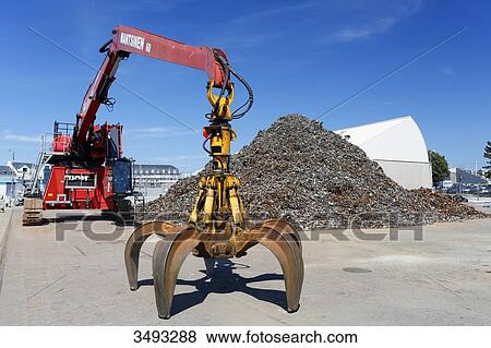 France, Normandy, Granville. The port. Scrap iron from household waste waiting to go to Russia or China for recycling. View Large Photo Image Stock Photo - France, Normandy, Granville. The port. Scrap iron from household waste waiting to go to Russia or China for recycling.. Fotosearch