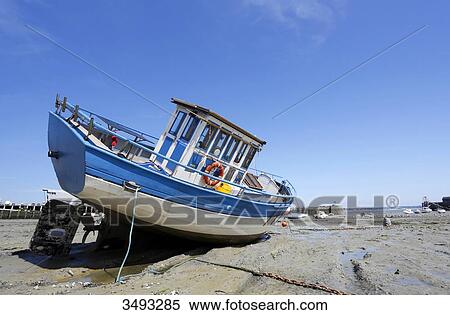 France, Normandy, Granville. The harbour at low tide during spring tides. View Large Photo Image Stock Photography - France, Normandy, Granville. The harbour at low tide during spring tides.. Fotosearch
