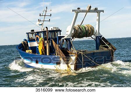 France, Normandy, little trawler going fishing View Large Photo Image Stock Photo - France, Normandy, little trawler going fishing. Fotosearch
