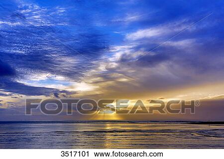 France, Normandy. Manche. Montmartin sur Mer. Sunset on the sea during fall. View Large Photo Image Stock Image - France, Normandy. Manche. Montmartin sur Mer. Sunset on the sea during fall.. Fotosearch