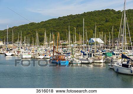France, Normandy, normandic harbour for pleasure boats in Dives sur Mer View Large Photo Image Stock Photo - France, Normandy, normandic harbour for pleasure boats in Dives sur Mer. Fotosearch
