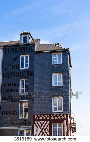 Stock Photo - France, Normandy, old faade on the harbour of Honfleur. Fotosearch
