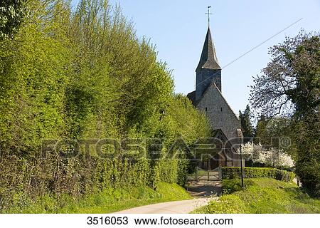 Stock Image - France, Normandy, old traditionnal church in a little village. Fotosearch