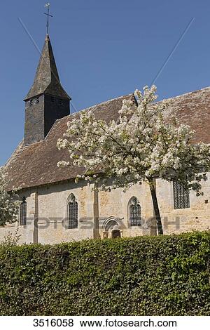 Stock Photo - France, Normandy, old traditionnal church in a little village. Fotosearch