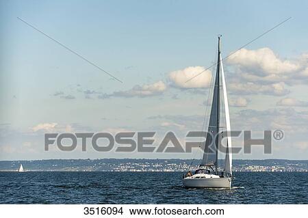 France, Normandy, sailing boats in the sea close to the coast View Large Photo Image Picture - France, Normandy, sailing boats in the sea close to the coast. Fotosearch