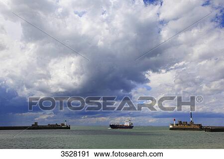 France, Normandy, Seine-Maritime, Le Havre. Ship entering the harbour. View Large Photo Image Stock Image - France, Normandy, Seine-Maritime, Le Havre. Ship entering the harbour.. Fotosearch