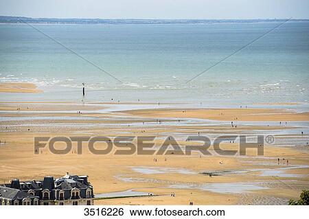 France, Normandy, the beach of Houlgate seen from a high point of view at low tide View Large Photo Image Stock Photograph - France, Normandy, the beach of Houlgate seen from a high point of view at low tide. Fotosearch