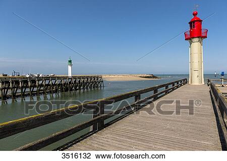 France, Normandy, the lighthouse from Trouville on a beautiful summer day View Large Photo Image Stock Image - France, Normandy, the lighthouse from Trouville on a beautiful summer day. Fotosearch
