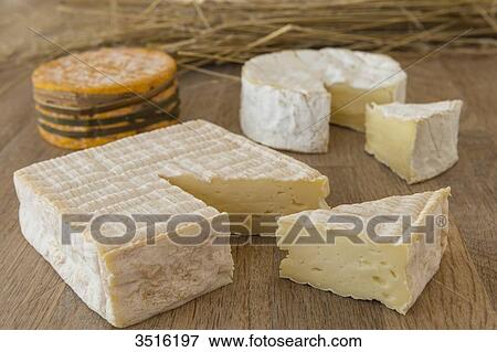 France, Normandy, three typical norman cheeses on cheeseboard View Large Photo Image Stock Photo - France, Normandy, three typical norman cheeses on cheeseboard. Fotosearch