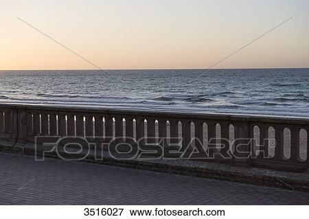 France, Normandy, view from the seawall of Cabourg after sunset View Large Photo Image Stock Photo - France, Normandy, view from the seawall of Cabourg after sunset. Fotosearch