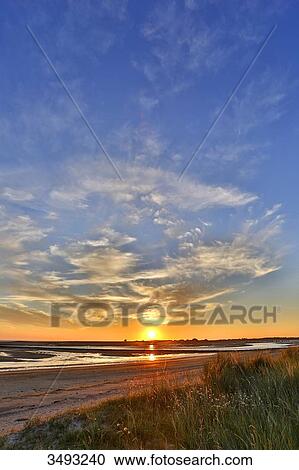 France, Normandy. View of the Regneville-sur-Mer Bay and Agon-Coutainville at sunset. Period of high tides View Large Photo Image Stock Image - France, Normandy. View of the Regneville-sur-Mer Bay and Agon-Coutainville at sunset. Period of high tides. Fotosearch