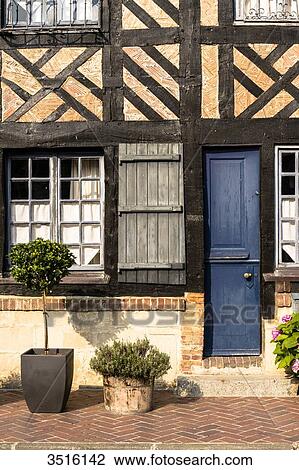 France, Normandy, well preserved old traditionnal houses in normandic style in the village of Beuvron en Auge View Large Photo Image Stock Image - France, Normandy, well preserved old traditionnal houses in normandic style in the village of Beuvron en Auge. Fotosearch
