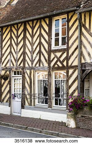 France, Normandy, well preserved old traditionnal houses in normandic style in the village of Beuvron en Auge View Large Photo Image Stock Photo - France, Normandy, well preserved old traditionnal houses in normandic style in the village of Beuvron en Auge. Fotosearch