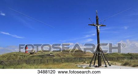 Stock Image - France, North Coast. Berck sur Mer. Cross and lighthouse. Fotosearch
