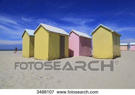 Stock Photo - France, North Coast. Berck sur Mer. Colorful beach huts.. Fotosearch