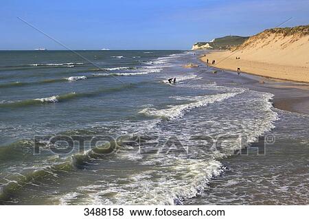 France, North Coast. Wissant beach at high tide. Background: Cap Blanc Nez View Large Photo Image Stock Photo - France, North Coast. Wissant beach at high tide. Background: Cap Blanc Nez. Fotosearch