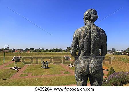 Picture - France, Northern France, Gravelines. Gardens of the Arsenal. Art work La Vigie by Charles Radenne. Fotosearch