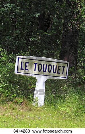 Stock Image - France, Northern France, Le Touquet. Old sign at the city entrance. Fotosearch