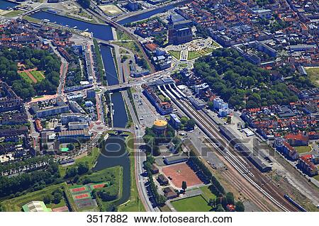 France, Northern France, Pas de Calais. Calais. City hall and train station View Large Photo Image Stock Image - France, Northern France, Pas de Calais. Calais. City hall and train station. Fotosearch