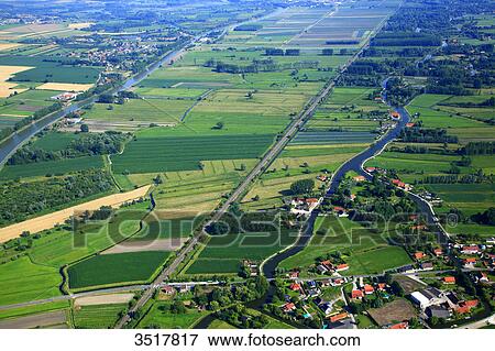 France, Northern France, Pas de Calais, Audomarois. Audomarois marsh or St-Omer marsh. Serques marsh in the foreground. View Large Photo Image Stock Photo - France, Northern France, Pas de Calais, Audomarois. Audomarois marsh or St-Omer marsh. Serques marsh in the foreground.. Fotosearch
