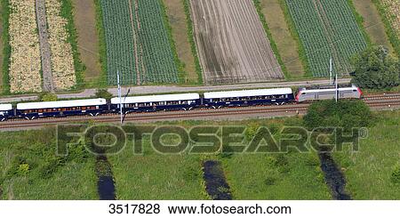 France, Northern France, Pas de Calais, Audomarois. Orient express arriving in St-Omer. View Large Photo Image Stock Photo - France, Northern France, Pas de Calais, Audomarois. Orient express arriving in St-Omer.. Fotosearch