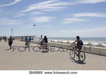 Stock Photo - France, Notre-Dame-de-Monts, Vendee, walkway along the beach.. Fotosearch