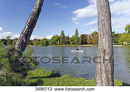 France, Paris. 12th arrondissement. Vincennes. Bois de Vincennes. Lake Daumesnil. Tourists sailing. View Large Photo Image Stock Image - France, Paris. 12th arrondissement. Vincennes. Bois de Vincennes. Lake Daumesnil. Tourists sailing.. Fotosearch