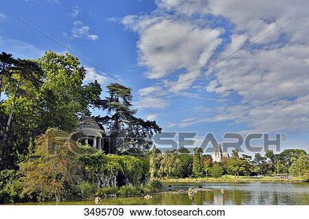 Stock Photo - France, Paris. 12th arrondissement. Vincennes. Bois de Vincennes. Lake Daumesnil. Ile de Reuilly. Romantic Rotunda.. Fotosearch