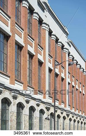 Stock Image - France. Paris 13th district. Avenue d'Ivry. The former Panhard et Levassor factory, the first automobile factory in the world (1891) transformed into an office building. Fotosearch