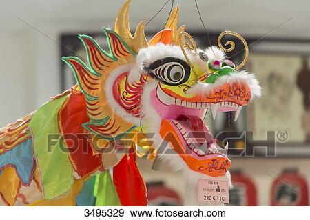 France. Paris 13th district. Parisian Chinatown. Chinese dragon in a store, avenue de Choisy View Large Photo Image Stock Photo - France. Paris 13th district. Parisian Chinatown. Chinese dragon in a store, avenue de Choisy. Fotosearch