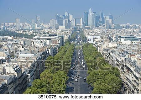 Stock Photography - France. Paris 16th district. Area of Place de l'Etoile. Avenue de la Grande Arme. In the background: buildings of La Defense. Fotosearch