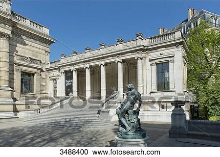 France. Paris 16th district. The Galliera palace, the museum of the fashion of the City of Paris. Architect: Leon Ginain (1894). In the center: the statue of the God Pan and a tiger of Just Becquet ( 1897 ) View Large Photo Image Stock Image - France. Paris 16th district. The Galliera palace, the museum of the fashion of the City of Paris. Architect: Leon Ginain (1894). In the center: the statue of the God Pan and a tiger of Just Becquet ( 1897 ). Fotosearch