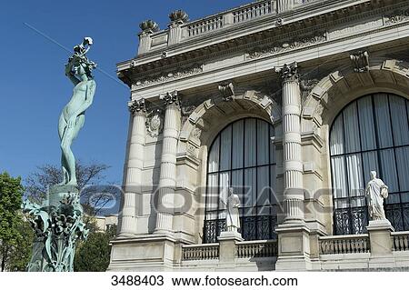 Stock Image - France. Paris 16th district. The Galliera palace, the museum of the fashion of the City of Paris. Architect: Leon Ginain (1894). Bronze statue decorating the fountain of April, by Pierre Roche ( 1916 ). Fotosearch