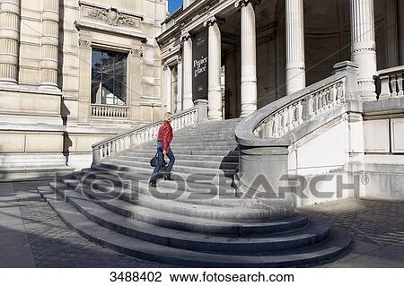 France. Paris 16th district. Woman climbing up the stairs of the Galliera palace, the museum of the fashion of the City of Paris. Architect: Leon Ginain (1894). View Large Photo Image Stock Image - France. Paris 16th district. Woman climbing up the stairs of the Galliera palace, the museum of the fashion of the City of Paris. Architect: Leon Ginain (1894).. Fotosearch