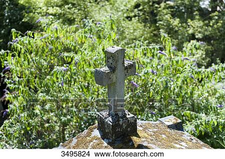 Picture - France, Paris 20th district. Pere Lachaise cemetery. A cross. Fotosearch