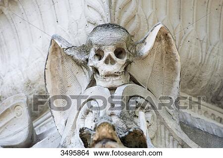 France, Paris 20th district. Pere Lachaise cemetery. Winged skull decorating the grave of Etienne Robertson View Large Photo Image Picture - France, Paris 20th district. Pere Lachaise cemetery. Winged skull decorating the grave of Etienne Robertson. Fotosearch